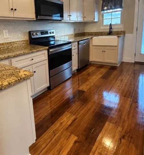 Freshly cleaned kitchen, cabinets and floors ready for move-in